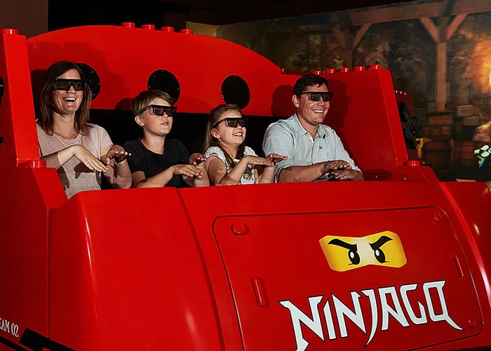 Family in the LEGOLAND ride NINJAGO The Ride